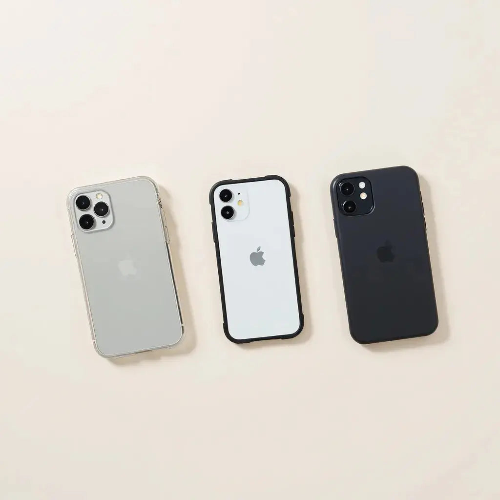Assorted iPhone cases in clear, rugged, and slim styles on a neutral studio background